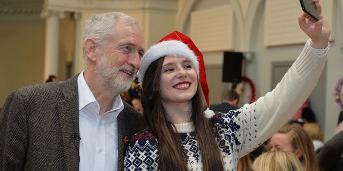 EDINBURGH, SCOTLAND - DECEMBER 16: UK Labour leader Jeremy Corbyn poses for a selfie with a volunteer at Nelson Hall Community Centre on December 16, 2018 in Edinburgh, Scotland. The UK Labour leader joined with Scottish Labour leader Richard Leonard and Deputy Scottish Labour leader Lesley Laird as they shared Christmas lunch with homelessness activists and Labour Supporters in Edinburgh. (Photo by Mark Runnacles/Getty Images)