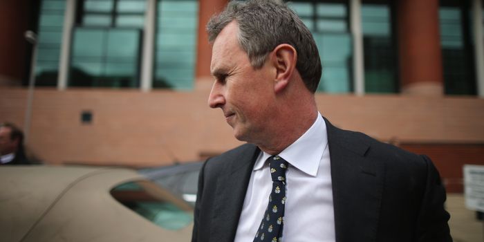 PRESTON, LANCASHIRE - APRIL 10: Former deputy speaker of the House of Commons Nigel Evans (C) leaves Preston Crown Court, after being found not guilty of alleged sexual offences on April 10, 2014 in Preston, Lancashire. Nigel Evans, the former deputy speaker of the House of Commons has been cleared and found not guilty of nine sexual charges against him dating from 2002 to April 1, 2013. (Photo by Christopher Furlong/Getty Images)