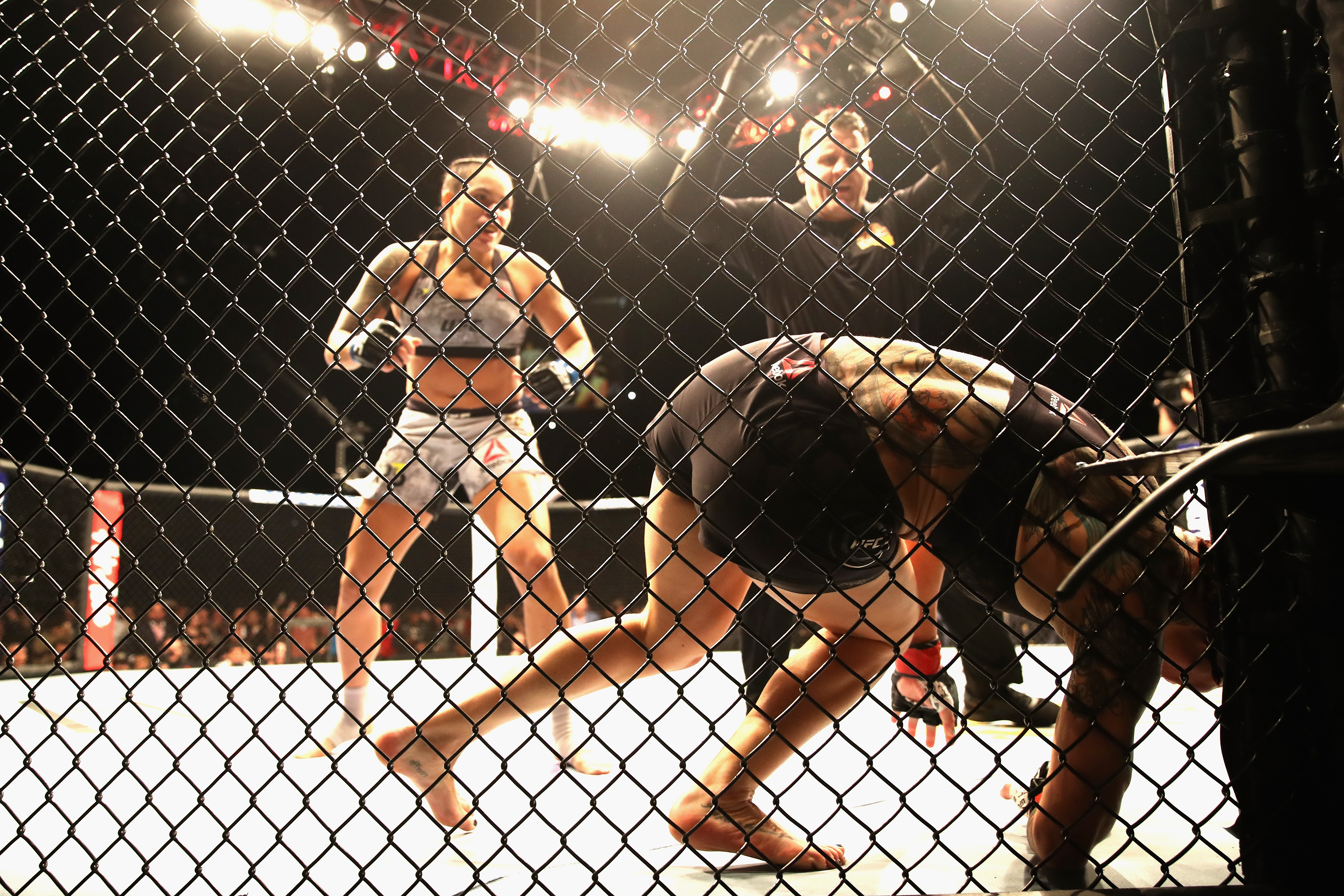 INGLEWOOD, CA - DECEMBER 29: Cris Cyborg of Brazil (right) is defeated by TKO in the first round by Amanda Nunes of Brazil (left) during a Women's Feather weight bout during the UFC 232 event inside The Forum on December 29, 2018 in Inglewood, California. (Photo by Sean M. Haffey/Getty Images)