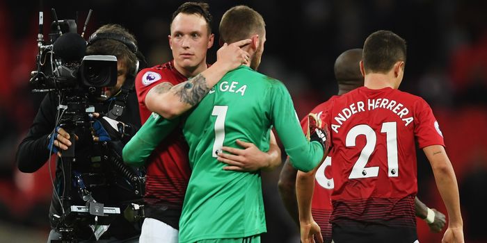 LONDON, ENGLAND - JANUARY 13: Phil Jones of Manchester United congratulates David De Gea after the Premier League match between Tottenham Hotspur and Manchester United at Wembley Stadium on January 13, 2019 in London, United Kingdom. (Photo by Mike Hewitt/Getty Images)