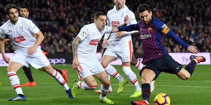 BARCELONA, SPAIN - JANUARY 13: Lionel Messi of FC Barcelona scores his team's second goal during the La Liga match between FC Barcelona and SD Eibar at Camp Nou on January 13, 2019 in Barcelona, Spain. The goal is Messi's 400th goal in La Liga for FC Barcelona. (Photo by David Ramos/Getty Images)