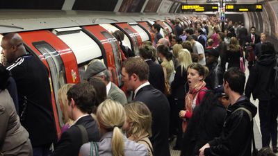 London Underground passengers made to stand so a cake could have a seat