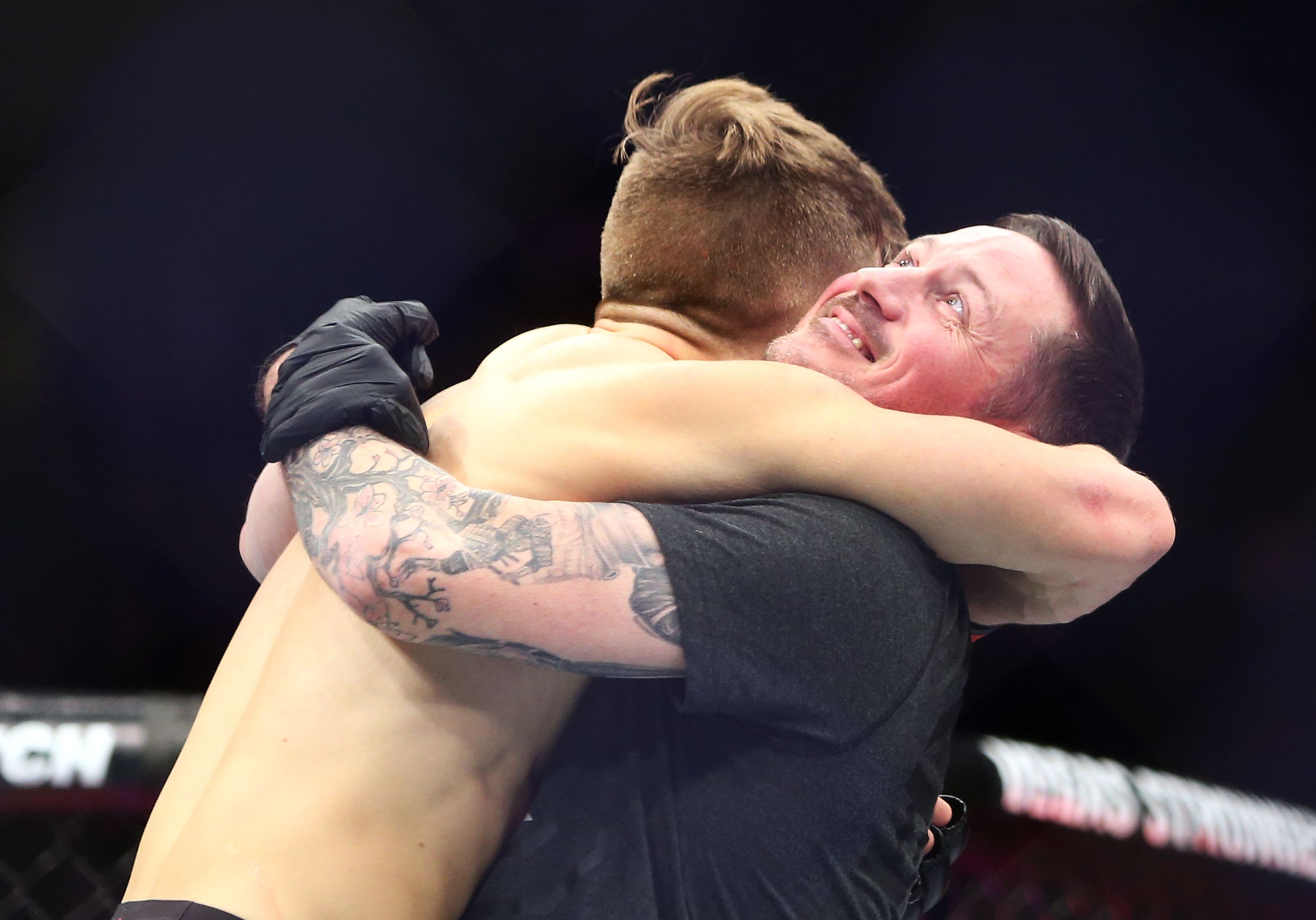 TORONTO, ON - DECEMBER 8:  Brad Katona of Canada celebrates with coach John Kavanagh after victory against Matthew Lopez of the United States in a bantamweight bout during the UFC 231 event at Scotiabank Arena on December 8, 2018 in Toronto, Canada.  (Photo by Vaughn Ridley/Getty Images)