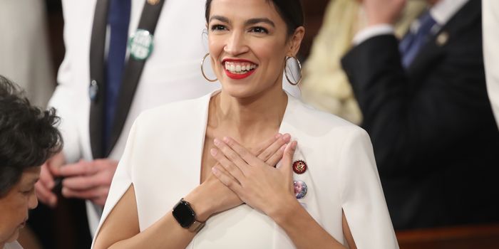 WASHINGTON, DC - FEBRUARY 05: U.S. Rep. Alexandria Ocasio-Cortez (D-NY) greets fellow lawmakers ahead of the State of the Union address in the chamber of the U.S. House of Representatives on February 5, 2019 in Washington, DC. President Trump's second State of the Union address was postponed one week due to the partial government shutdown. (Photo by Win McNamee/Getty Images)