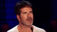 Audience left in shock after Simon Cowell is set on fire by masked contestant
