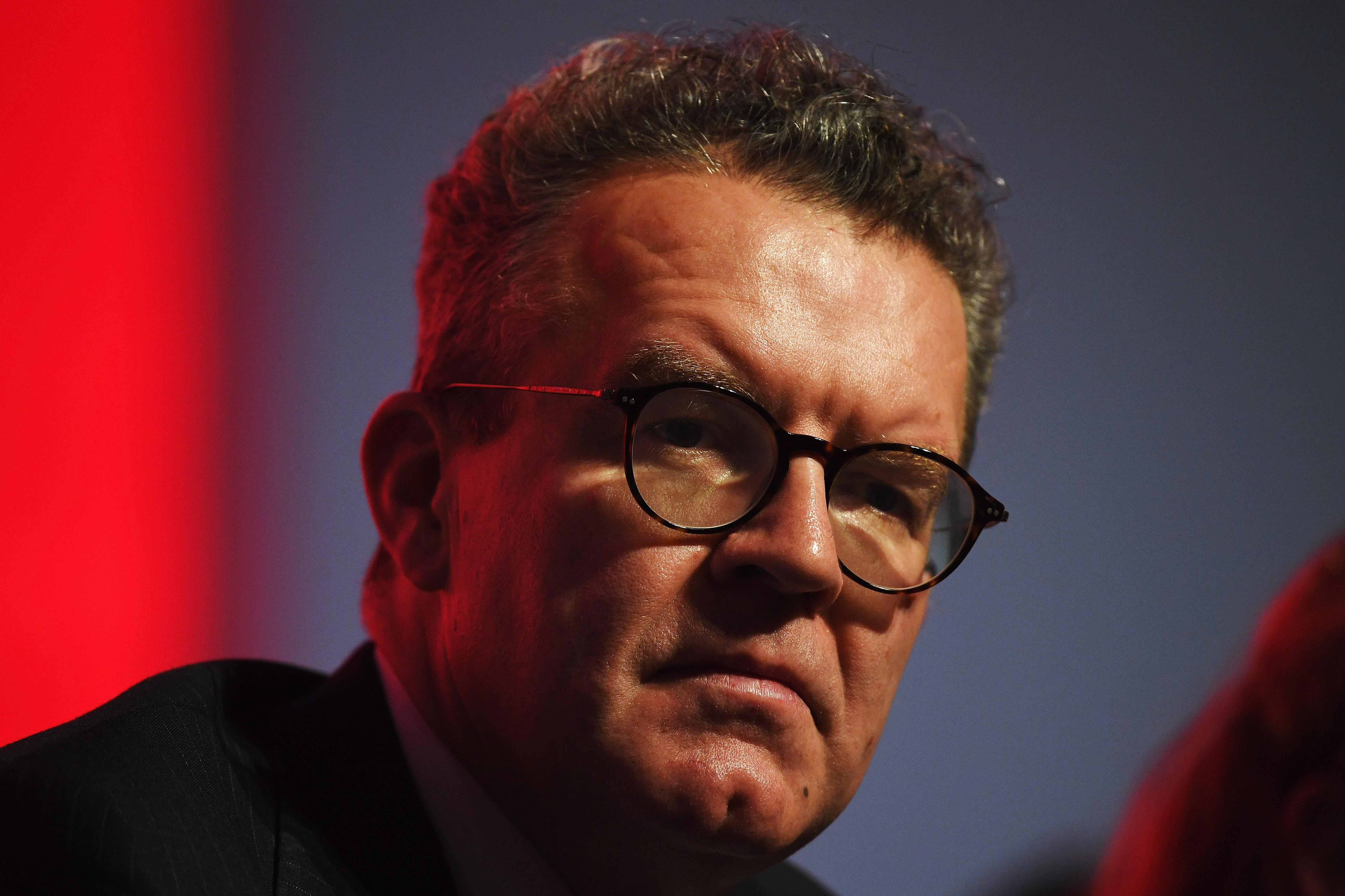 LIVERPOOL, ENGLAND - SEPTEMBER 26:  Deputy Leader of the Labour Party, Tom Watson listens as Labour Party leader, Jeremy Corbyn addresses delegates on day four of the Labour Party conference at the Arena and Convention Centre on September 26, 2018 in Liverpool, England. In his closing speech to the conference the Labour leader will promise to "kickstart a green jobs revolution" and expand the provision of free childcare should Labour win power.  (Photo by Leon Neal/Getty Images)