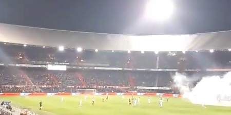 Feyenoord fans shoot fireworks into stadium after being banned… over fireworks