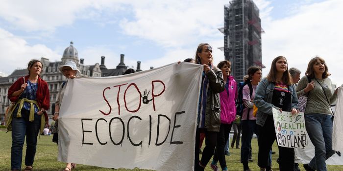 Envrionmental campaigners from the "Extinction Rebellion" group prepare to block a section of Parliament Square as part of their ongoing actions and protests across the capital, on April 24, 2019 in London, England. Now in it's tenth day, the protests have involved roadblocks, sit-ins and the halting of sections of the public transport system, in a bid to highlight environmental concerns. (Photo by Leon Neal/Getty Images)