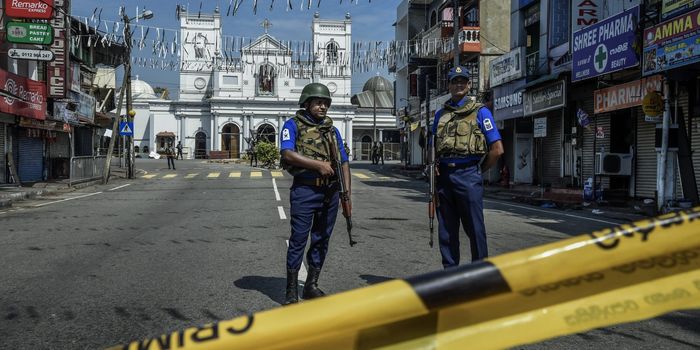 Security personnal at St Anthony's Church on April 24, 2019 in Colombo, Sri Lanka. At least 321 people were killed and 500 people injured after coordinated attacks on churches and hotels on Easter Sunday which rocked three churches and three luxury hotels in and around Colombo as well as at Batticaloa in Sri Lanka. According to reports, the Islamic State group have claimed responsibility on Tuesday for the attacks while investigations show the attacks were carried out in retaliation for the Christchurch mosque shootings last month. Police have detained 40 suspects so far in connection with the suicide bombs while the country’s government blame the attacks on local Islamist group National Thowheed Jamath (NTJ). (Photo by Atul Loke/Getty Images)