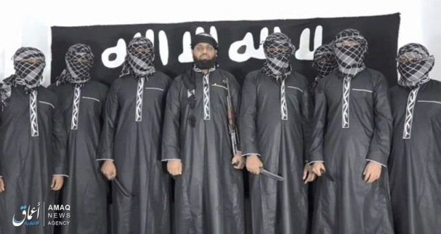 ISIS released this image claiming to depict the Sri Lanka bombers (Credit: Amaq)
