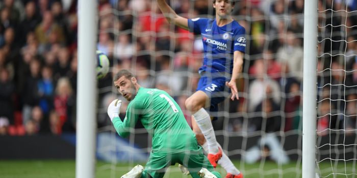 David De Gea of Manchester United looks on as he is beaten by Marcos Alonso of Chelsea as he scores his team's first goal during the Premier League match between Manchester United and Chelsea FC at Old Trafford on April 28, 2019 in Manchester, United Kingdom. (Photo by Shaun Botterill/Getty Images)