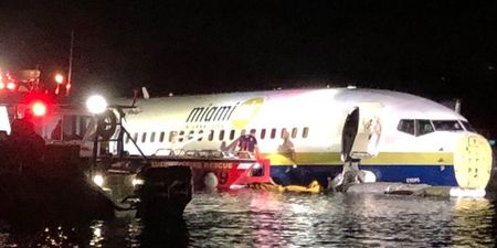 Boeing 737 skids into river after attempting to land during thunderstorm