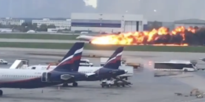 An Aeroflot plane burns on the runway at Sheremetyevo International airport in Moscow, Russia.