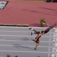 College athlete risks it all with superman dive to win 400m hurdles