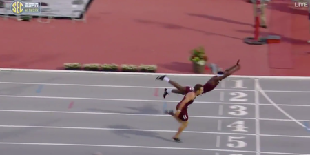 College athlete risks it all with superman dive to win 400m hurdles