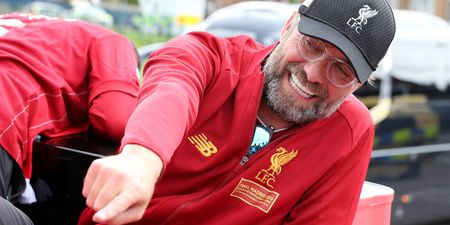 WATCH: Jurgen Klopp almost falls off bus during Liverpool’s trophy parade