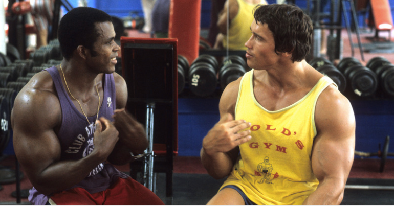 Arnold Schwarzenegger in the gym with Serge Nubret