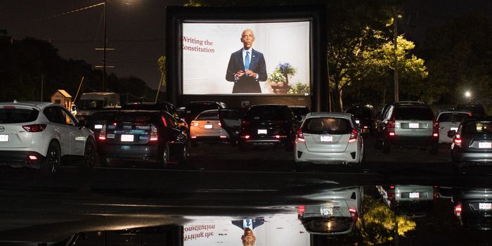 Barack Obama deliver his speech to the DNC, viewed from a drive-in theatre