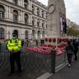 Extinction Rebellion place climate change banner on Cenotaph on Remembrance Day
