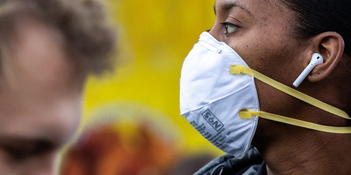 A woman wears a face mask to protect her from coronavirus