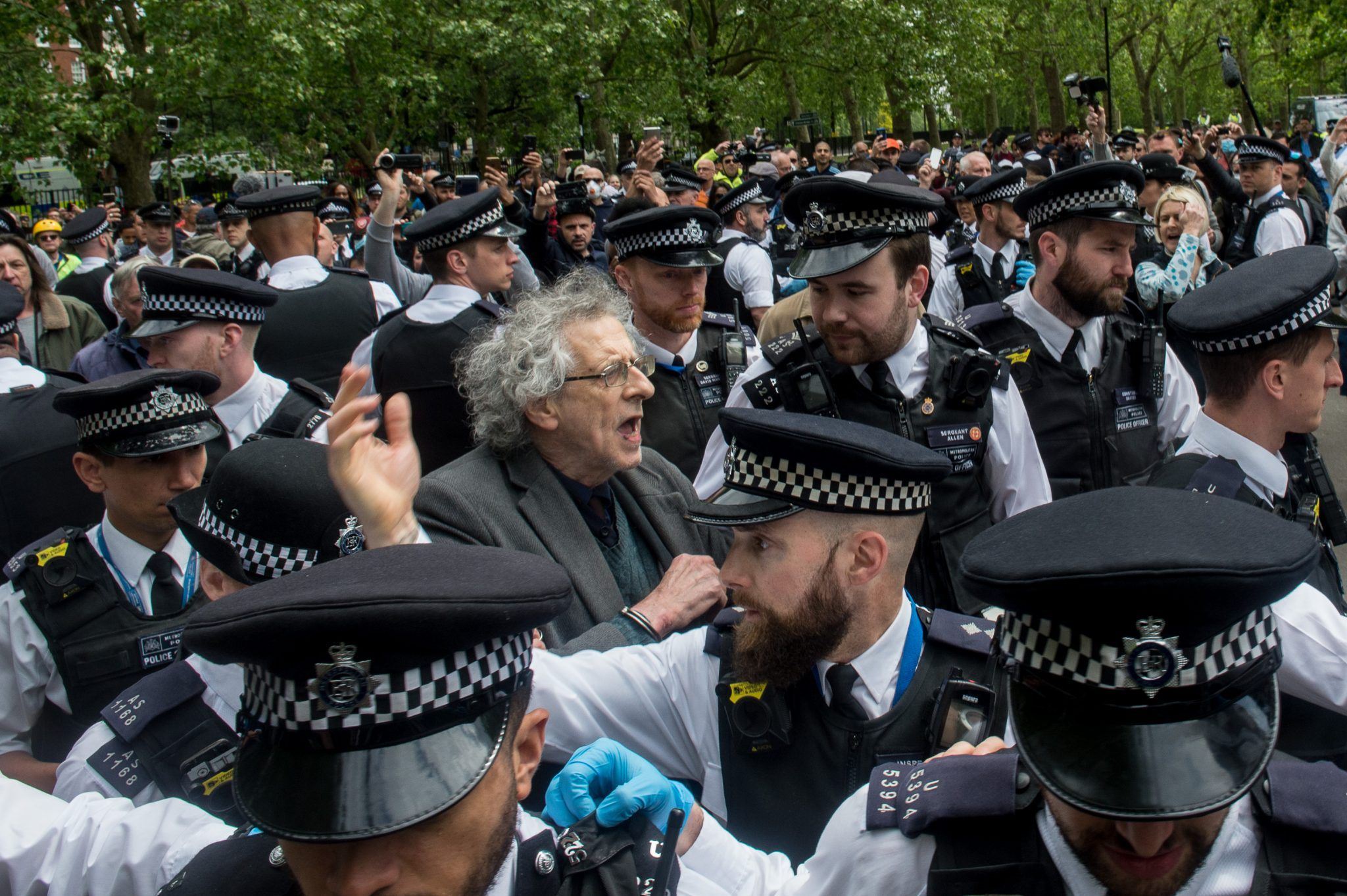 Piers Corbyn being arrested at an antivaxx protest