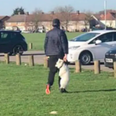 RSPCA searching for man seen carrying dog by collar in park