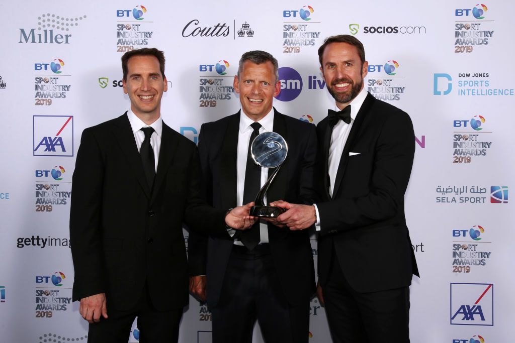 Mark Bullingham, Martin Glenn and Gareth Southgate pose for an award