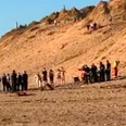 Three men stabbed in ‘fight’ involving axe and Samurai sword on beach