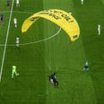 Greenpeace protestor almost parachutes into crowd at Germany vs France game
