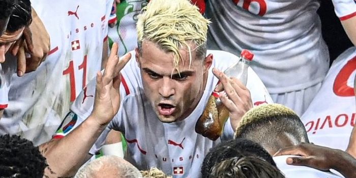 Grint Xhaka necks bottle of Coke before penalties against France
