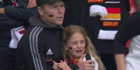 England fans heard cheering when crying German girl was shown on big screen