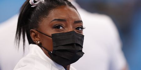 Simone Biles points to historic abuse from coach in retweet attacking critics