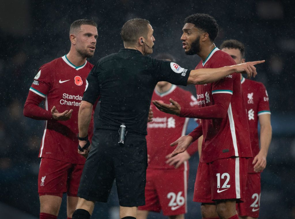 Liverpool players protest handball decision against Man City