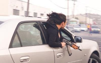 Woman spotted waving AK-47 out of car window