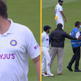 Cricket fan dressed as Indian player removed from pitch by stewards