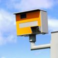 Man filmed climbing into speed camera and flashing drivers with phone