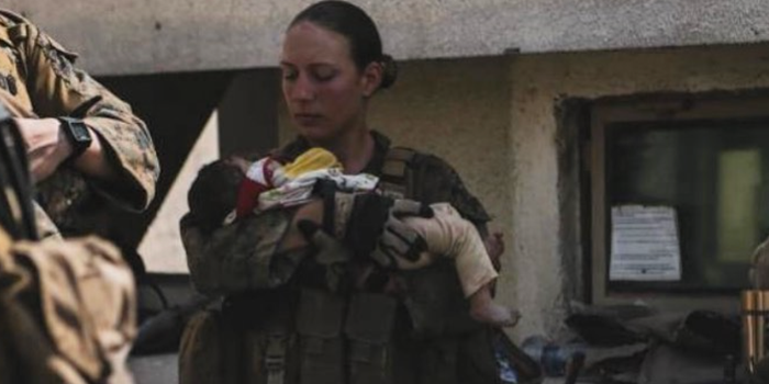 US marine shares post just days before her death of her caring for Afghan children