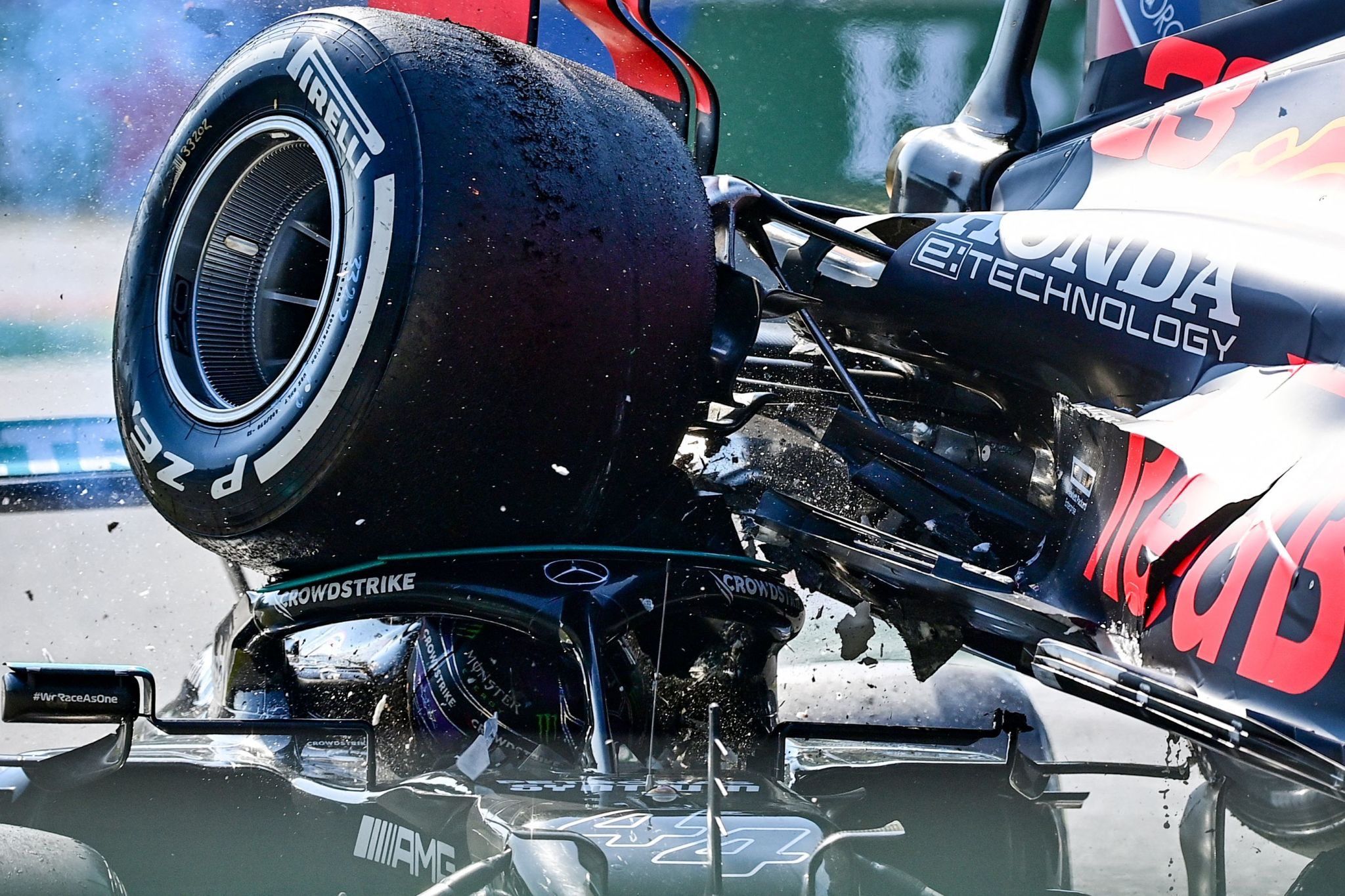 Verstappen's wheel on Hamilton's helmet