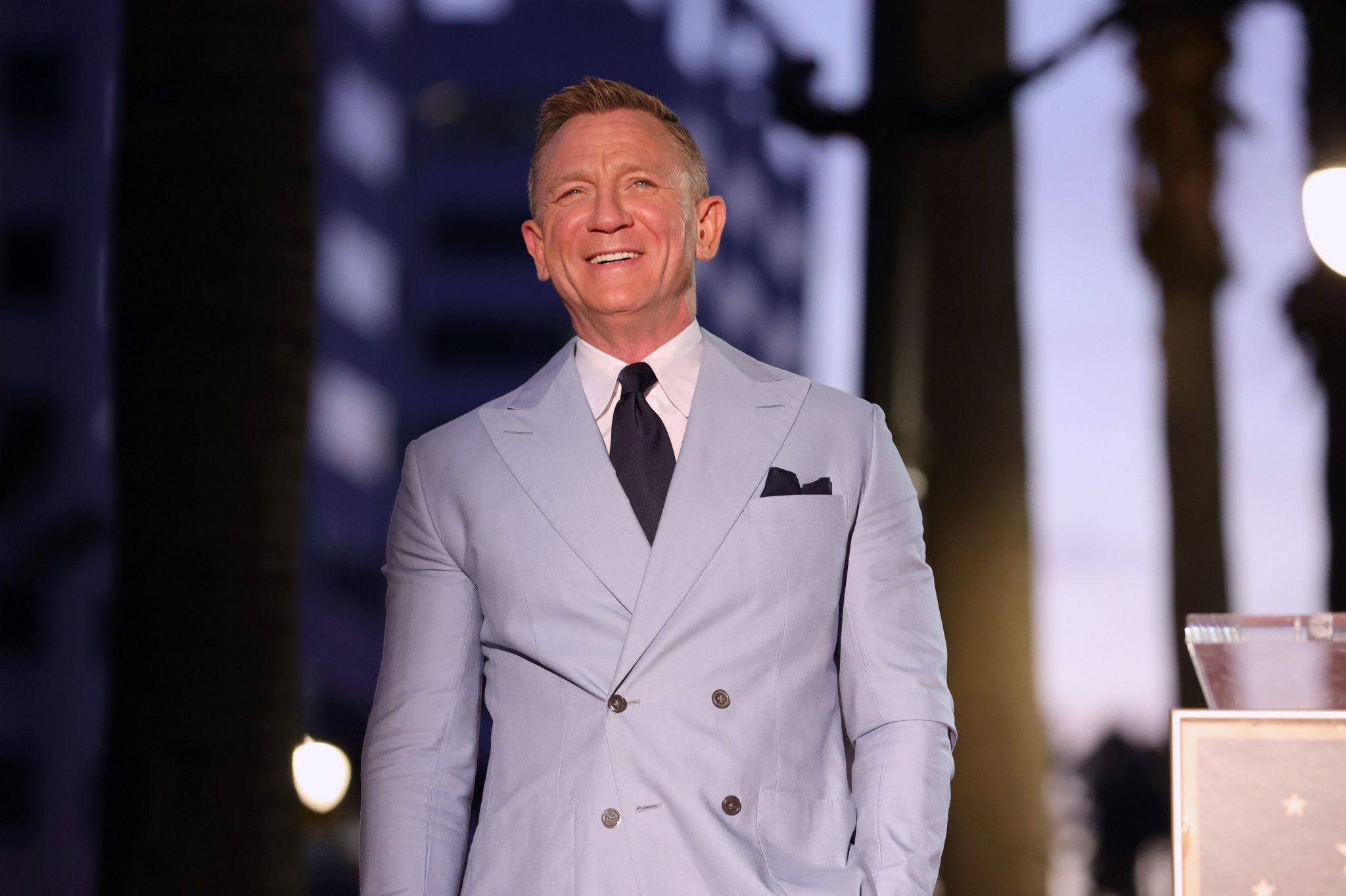 Daniel Craig says he often goes to gay bars to get away from aggressive men