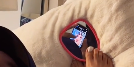 Woman sneakily uses mirror to catch her boyfriend looking at other women on Instagram
