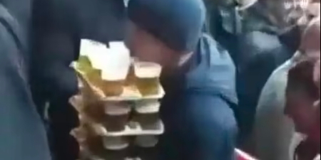 Guy seen carrying 64 pints to mates at football match