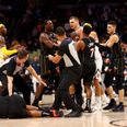 Ugly scenes erupt as 7 foot NBA player bodies opponent from behind