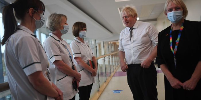 Boris JOhnson asked three times to put mask on during hospital visit
