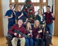 Congressman and family pose with guns for Christmas photo days after school shooting