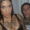Kourtney Kardashian seen with body covered in tattoos as she poses with Travis Barker