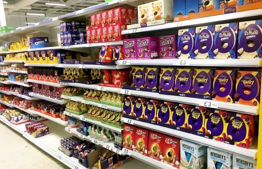 Supermarket shelves filled with Easter eggs