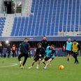 Inter Milan players warm-up for match at Bologna, despite the match being postponed