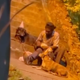 Camera catches homeless man throwing birthday party for his dog