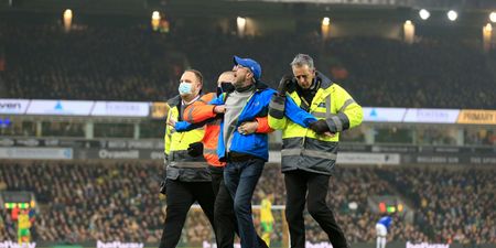 Everton fan storms pitch at Carrow Road to confront Rafa Benitez