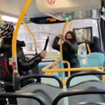 Passengers look on as schoolboys launch knife fight on top of bus in shocking footage